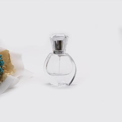 China Luxury Dubai Shape Glass Cosmetic Custom Perfume Bottle With Top Cap High Quality for sale