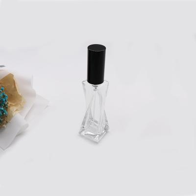 China Cosmetic Custom Shaped Transparent Perfume Spray Bottle 20ml With 18mm Black Cap for sale