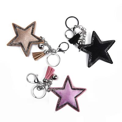 China Easy To Wear Customized Suede Tassel Rhinestone Key Chain Star Shaped Key Chain Promotional Gifts for sale