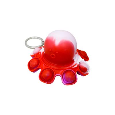 China New Octopus Classic Animal Face Silicone Changing Hanging Children's Water Playing Decompression Puzzle Toy Double Sided Flip Doll for sale