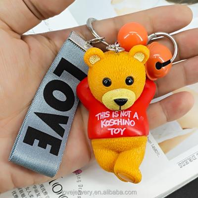 China Easy To Wear Yongze Fashion Bear Key Holders Cute Bear Acrylic Bell Key Chain With LOVE Logo Key Chain for sale