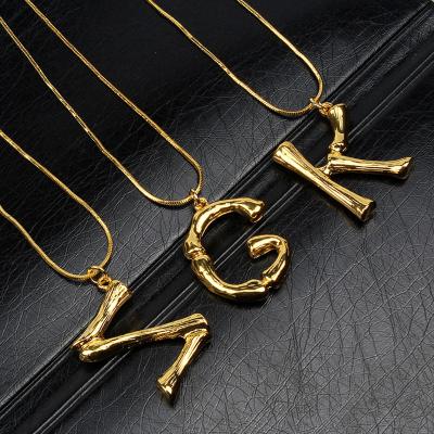 China Real Fashion Bamboo Letter Necklace Gold Plated A-z Letter Initial Alphabet Pendant Necklace for sale