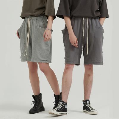 China custom Anti-wrinkle summer drawstring sweat shorts big pockets loose 350GSM washed distressed wide leg shorts mens for sale