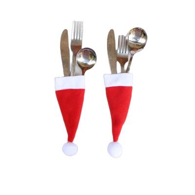 China Christamas Home Decoration 10 Pcs One Set Christmas Hat Cutlery Bag Candy Gift Bags Cute Fork Knife Holder Table Dinner Decoration for sale