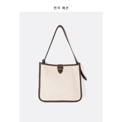 China Lady Women's Retro Bag New Large-capacity Canvas Shoulder Bag Trend Niche Handbag Square Tote Bag for sale