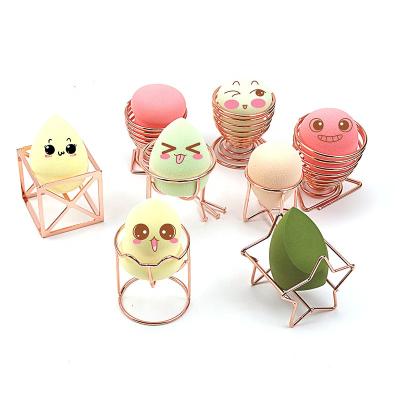 China Viable Beauty Rack Wire Egg Powder Blast Storage Rack Sponge Drying Stand Blender Makeup Sponge Rack for sale