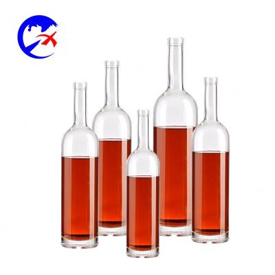 China 530ml Beverage Glass Wine Bottle With Cap For Spirits Whiskey Brandy Clear Bottle Glass for sale