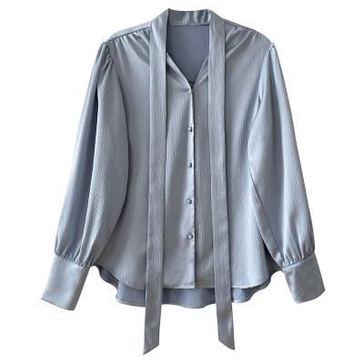 China Breathable Solid Crinke Button Tie V-Neck Casual Long Sleeve Loose Gather Tail Elegant Satin Blouse For Women for sale