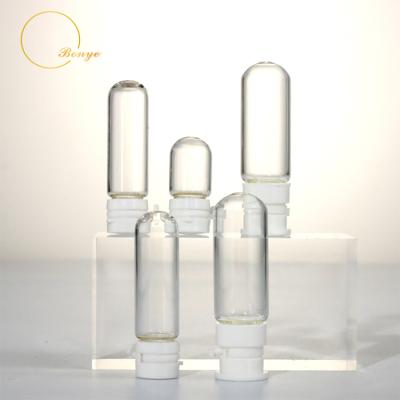 China 2ml 3ml 5ml Capacity Glass Lotion Cosmetic Custom Essential Oil Ampoule Bottle With Removable Lid Skin Care Set Empty Cosmetic Bottle for sale