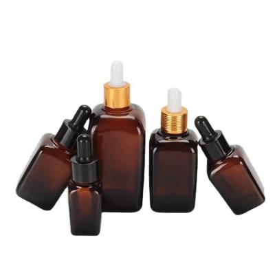 China 10ml 15ml 20ml 30ml 50ml 100ml Face Cosmetic Amber Square Eye Essential Oil Lids Glass Black Dropper Bottle for sale