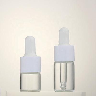 China Cosmetic Customizable Clear White Glass Dropper Bottle Essential Oil Cap Capacity Round Shape for sale