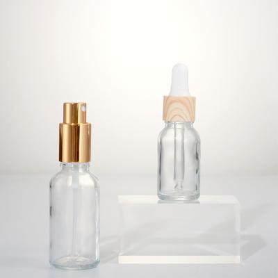 China 5ml/10ml/20ml/30ml/50ml/100ml Personal Care Essential Oil Bottle Clear Bamboo Dropper Cap Glass Empty Bottle for sale