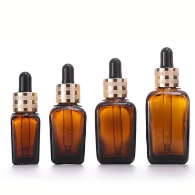 China Wholesale Comestic Factory Price Amber Square 5ml/10ml/15ml/30ml/50ml/100ml Flat Glass Cosmetic Packaging Essential Oil Dropper Bottle for sale