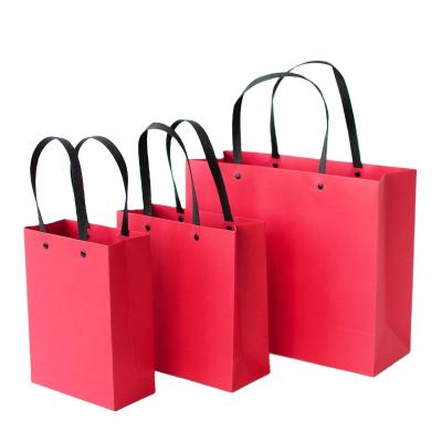 China Luxury Recycled Bag Logo Recycled Paper Shopping Gift Custom Materials Wholesale Fashion Design Kraft Paper Bags for sale