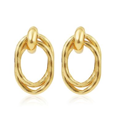 China Cute Irregular Geometric Girl's Hip Circle Cutout Gold Metal Newcomer Big Circle Earrings Women's Circle Earrings for sale