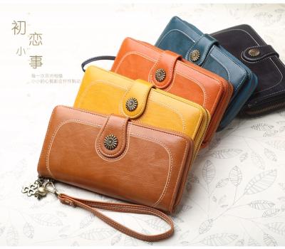 China Large Capacity Women Waterproof Zipper Clutch Wallet With Metal Button Long Lady Card Wallets Coin Purse for sale