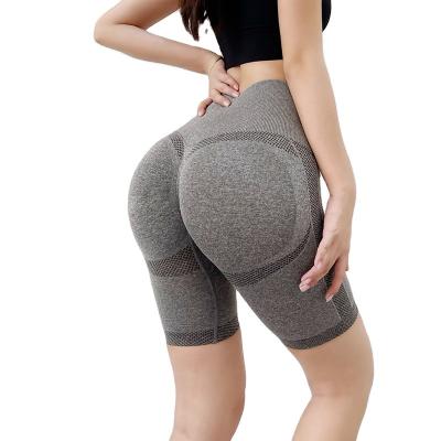 China Elastic Yoga Hip Peach Buttocks Sports Tights Hip Lift Fitness Pants Breathable Net Red Seamless Five-Point Waist High Handsome Pants for sale