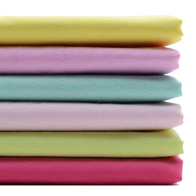 China Custom Made 100% Cotton Anti-static Stock Fabrics High Density Cotton Twill Color Clothing Fabric Material for sale