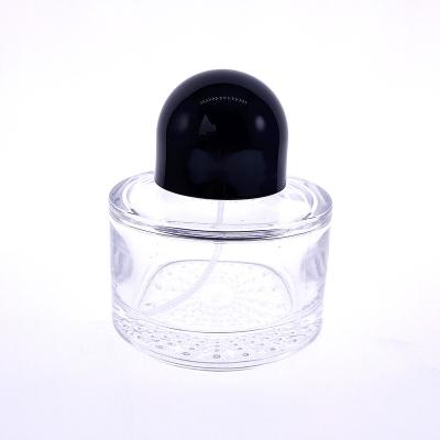 China Care MUB Personal Hot Sale Clear 50ml Glass Empty Perfume Bottle Glass Round Perfume Bottle With Spray for sale