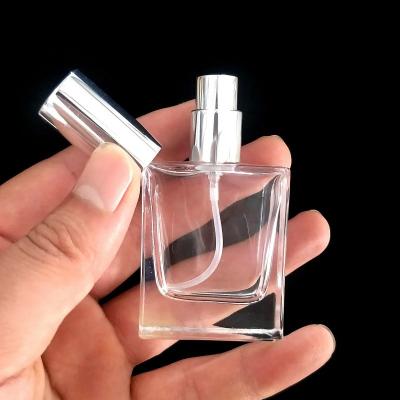 China CLOTHING MUB Perfume Glass Bottles 15ml Snap On The Neck Perfume Spray Bottle With Aluminum Sprayer for sale