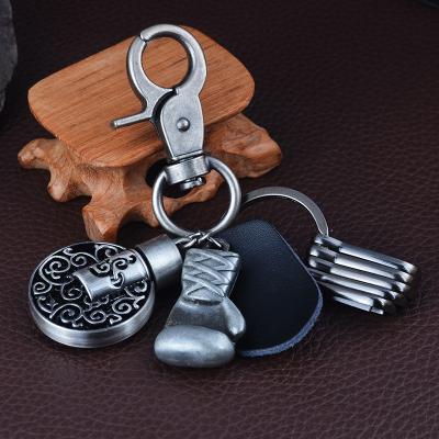 China ALLIAGE MUB 2017 New Design Promotional Key Chain With Small Boxing Gloves, Perfume Bottle Pendant for sale