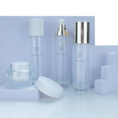 China Skin Care Packaging Fomalhaut Personal Maker Price Customize Cosmetic Glass Cap Bottle Set for sale