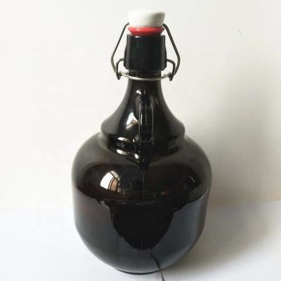 China 64oz Strong Thick Glass Beverage Gallon Bottle With Ceramic Top For Storing Beverage , Cooking Oil for sale