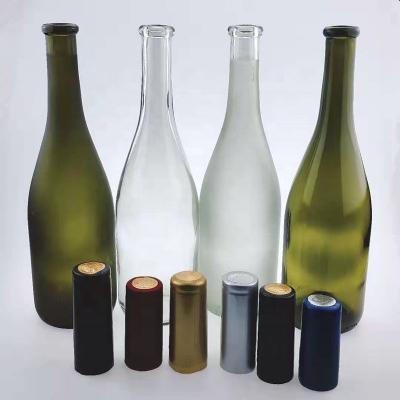 China Beverage 750ml food grade beverage champagne cork glass bottle with shrink film for sale