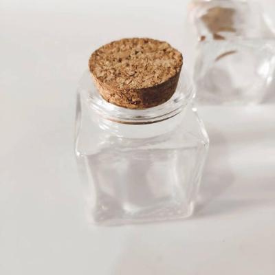 China Gift & Craft Square 50ml Mini Glass Jar Clear Glass Storage Jar With Cork for sale