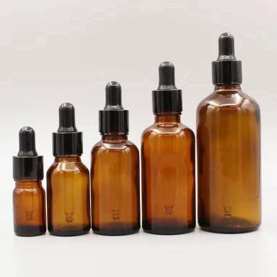 China Personal care 5ml 10ml 15ml 20ml 30ml 50ml 100ml clear/amber/cobalt blue/green glass bottles with droppers for storing essential oil for sale