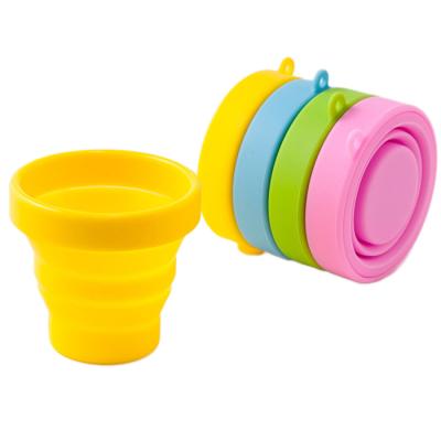 China 4 Colors Organoleptic Testing Available Reusable Mini Silicone Stocked Collapsible Cup With Lid BPA Free Easy To Carry for sale