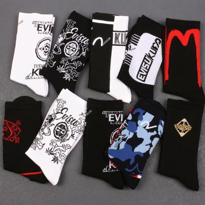 China QUICK DRY new men's sports socks long tube cotton fashion designer trend print custom logo autumn men's socks for sale