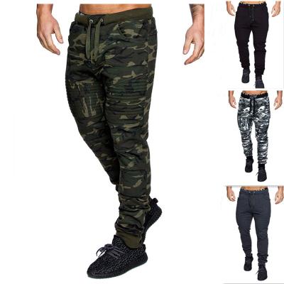 China Anti-wrinkle casual sports pants camouflage ruched stripe ripped drawstring waist sweat men jogger pants for sale