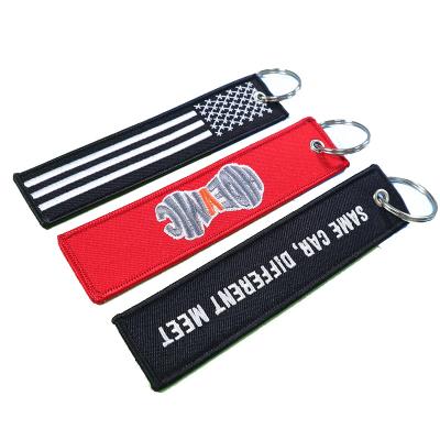 China Custom Cheap Jet Tag Fabric Embroidery Car Keychains Woven Key Chain Promotional Gifts Promotional Gifts for sale