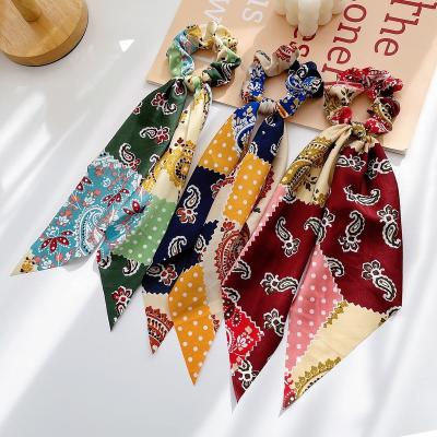 China Daily use 2022 simple European and American cash printed border ribbon scrunchie fashion solid color satin hair accessories for sale