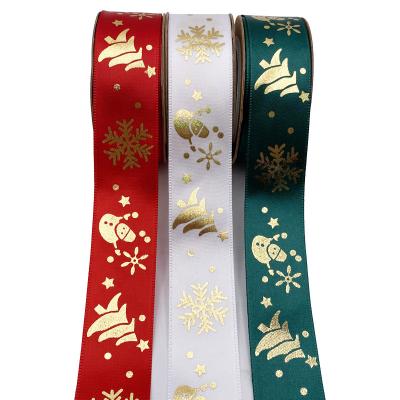 China Gift Christmas Bronzing Holiday Decoration Printing Snowflake Gift Cake Satin Ribbon Weaving Wholesale for sale