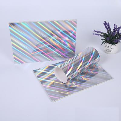 China Waterproof Ready To Ship Wholesale 250g A4 Silver Film Cardboard Packing Laser Holographic Paper for sale