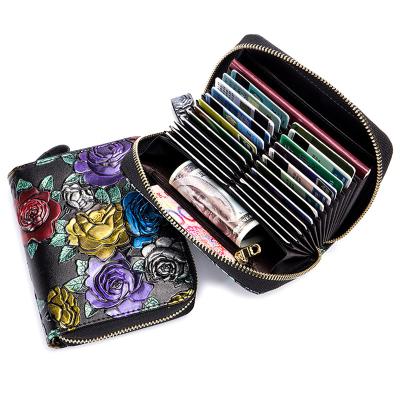 China Fashion Women's RFID Wallet Leather 3D Zipper Embossed Printing Designer Women Wallet With Passport Holder for sale