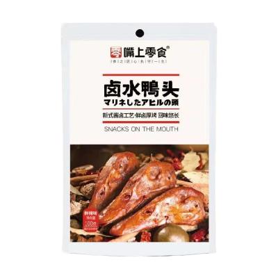 China Natural Mouth Snacks Fresh And Duck Head Spicy Pickled Instant Cooked Food Snacks Wholesale 100g Spicy Red Fillet Snacks for sale