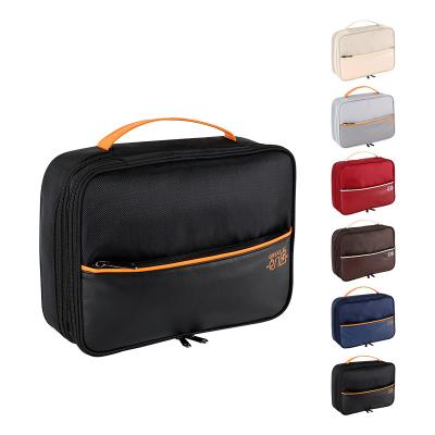 China 2023 high quality best-selling three-layer logo digital camera bag travel bag custom lock business bag durable easy to carry for sale