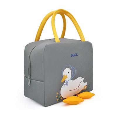 China Cute Cartoon Polyester Yellow Duck Lunch Portable Insulation Lunch Box Picnic Supplies Bag for sale