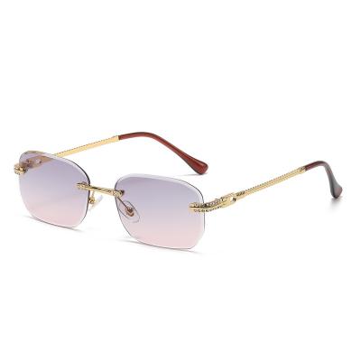 China 2022 Fashion Rectangle Diamond Metal Frame Women Rimless Sunglasses Fit Small Men's Luxury Sun Glasses 44 for sale