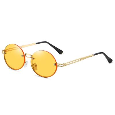 China 2022 Rimless European And American Women Rimless Round Sunglasses Metal Frame Custom Sun Glasses 3535 for sale