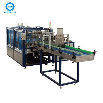 China Beverage PET Bottle Cardboard Box Wrap Around Glue Packer For Carbonated Drink Filling Line for sale