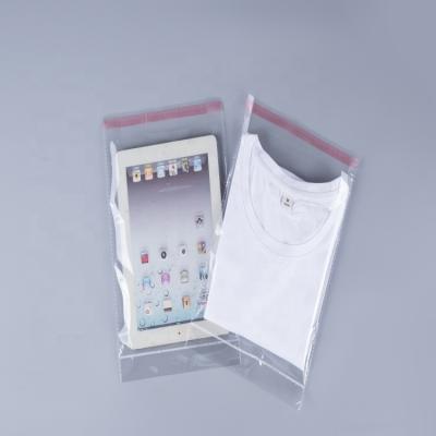 China Recyclable clear plastic resealable apparel dress pe polybag polybag opp cello packing self adhesive bag with hanging header for sale