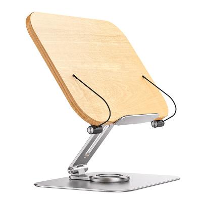 China 360 Degree Rotating Aluminum Alloy Wood Bamboo 360 Rotatable Adjustable Foldable Desk Stand 2022 New Arrival for sale