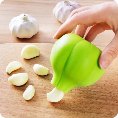 China Viable Garlic Silica Gel Peeler For Peeling Garlic By Hand To Remove Peeler Machine Kitchen Instrument for sale