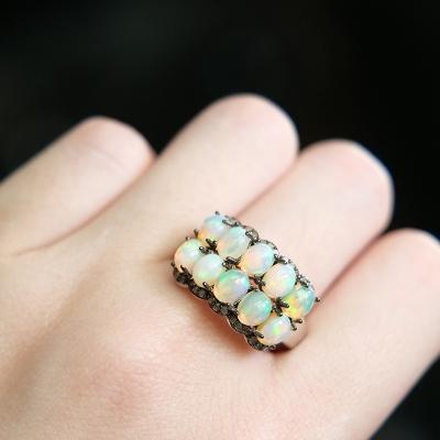 China FASHIONABLE designer small particle feel multi stone opal link fashion cutting edge modern jewelry woman ring for sale