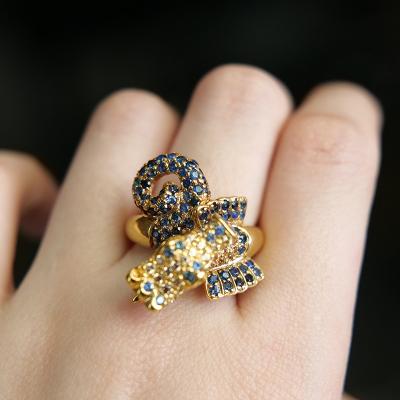 China CLASSIQUE dark blue inlaid densely rhinestone seahorse shape is hard to find one-of-a-kind gold lady fashionable unique ring for sale