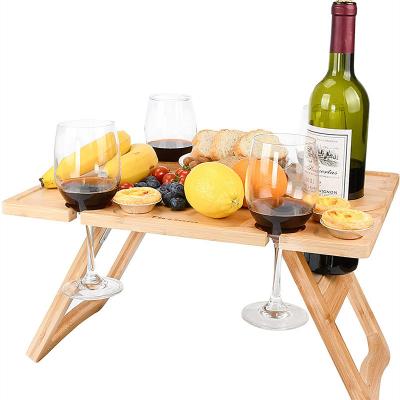 China Modern Adjustable Outdoor Folding Portable Large Bamboo Picnic Table Snacks and Cheese Tray with 4 Wine Glass Holder for sale